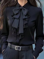 Elegant Ruffle-Trimmed Shirt With A Flowing Bow Tie