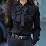 Elegant Ruffle-Trimmed Shirt With A Flowing Bow Tie