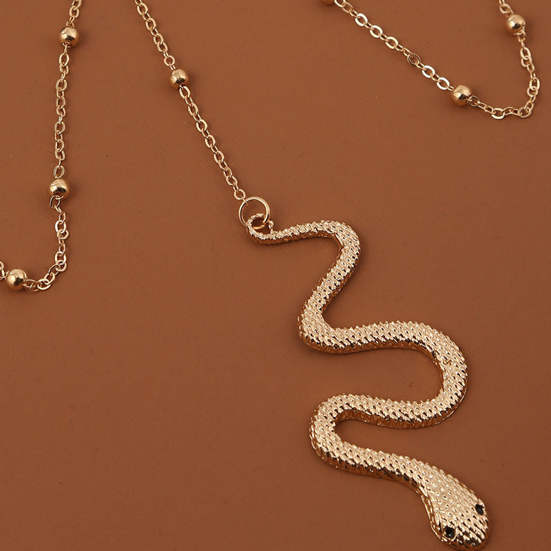 Bohemian Snake Pattern Gold Color Metal Beaded Thigh Chain